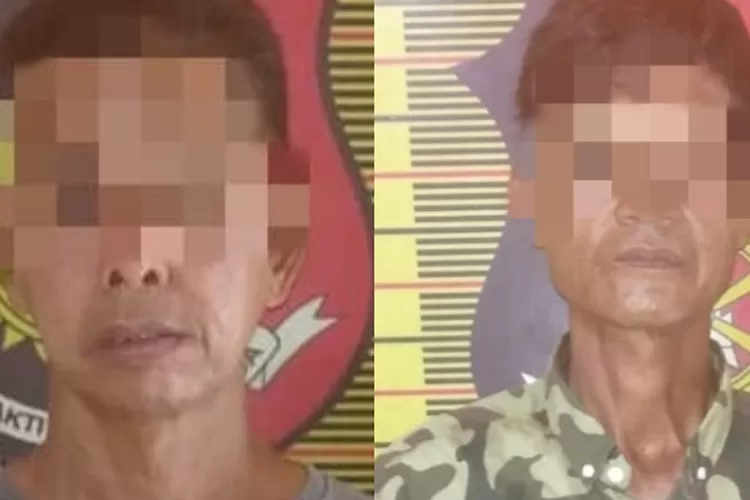 Dua pria terduga pelaku pungli, diamankan di Mapolsek Belawan, Minggu (14/7/2024), setelah ditangkap dari kawasan Simpang Kampung Salam dan Pajak Baru Belawan.