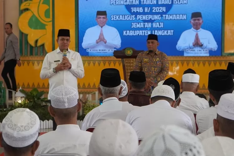 Pj Bupati Langkat saat menyambut kedatangan jamaah haji sekaligus peringatan 1 Muharram 1446 H (Realitasonline.id/AA)