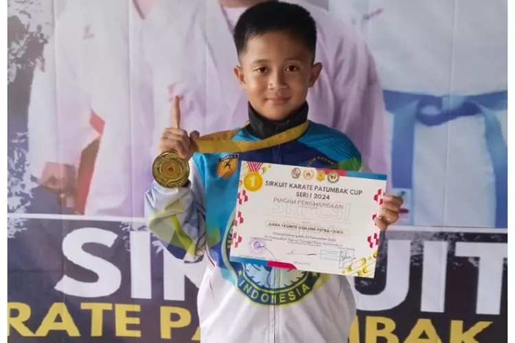 Rasyid Salman Pramana siswa MIN 9 Medan, awalnya suka berkelahi, kini raih berbagai prestasi Cabor karate junior dengan menyandang sabuk biru.