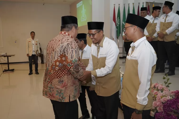 Bupati Asahan saat menghadiri pelantikan pengurus Pemuda Muhammadiyah (Realitasonline.id - Ist)