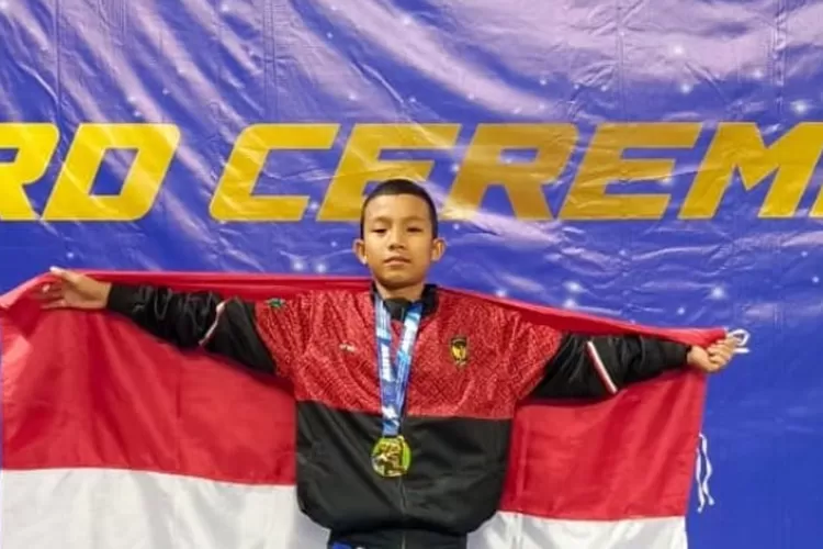 Kado istimewa di HUT ke 80 Kemerdekaan RI, Arif Rahman Siswa MIN 7 Tapteng Sumatera Utara raih medali emas di ajang kejuaraan Taekwondo internasional di Malaysia.(Realiitasonline.id/dok).