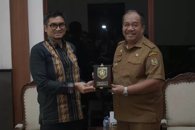 Bupati Asahan Taufik ZA Siregar saat menerima kunjungan Kepala BI Perwakilan Pematangsiantar, Ahmadi Rahman (Ist)