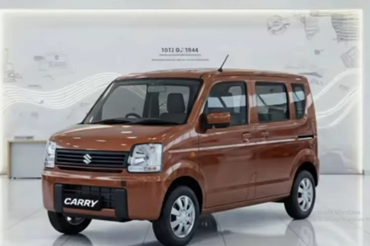 Suzuki Carry 2026 digambarkan sebagai penerus pick-up legendaris yang tampil lebih segar tanpa meninggalkan karakter dasarnya sebagai kendaraan usaha yang kuat dan mudah dirawat. (Tangkapan Layar YouTube  AutoMotionJA)