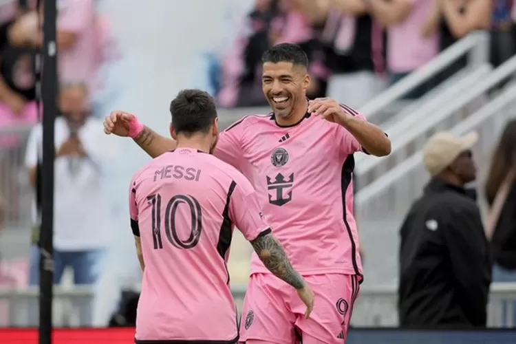 Luis Suarez dan Lionel Messi