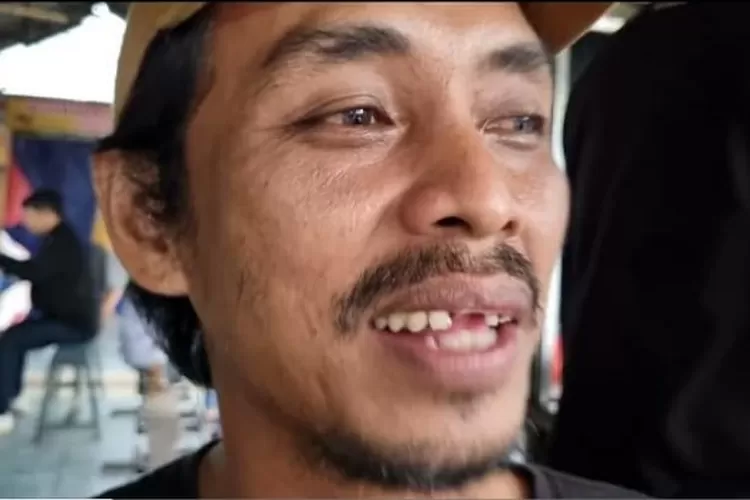 Foto : Robby (39), warga Kampung Padabeunghar, Kelurahan Babakan Pasar, Kecamatan Bogor Timur, Kota Bogor,  (Penulis/Febri Daniel Manalu)