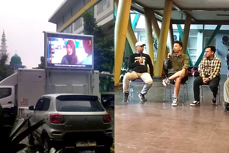 Puluhan sineas dan warga kota Bogor tetap antusias menonton film pendek meski diguyur hujan. Filmnya cerita tentang ini. (Nurohman)