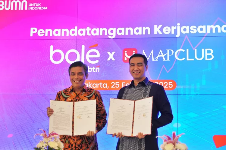 Direktur Utama PT Bank Tabungan Negara (Persero) Tbk, Nixon L.P Napitupulu dan Michel Hamilton, CEO PT Mapclub Digital Asia melakukan penandatanganan Nota Kesepahaman yang bertajuk Pembangunan Ekosistem Digital antara ritel &amp; perbankan.
