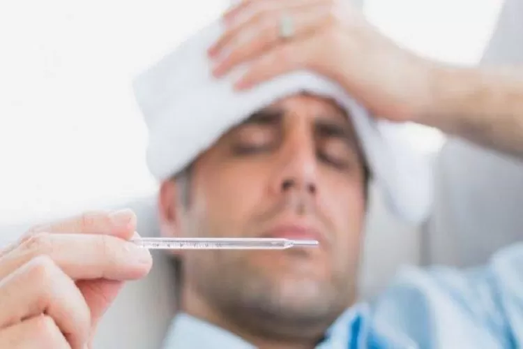 Seseorang Kondisi Tengah Demam Tinggi (Topmedia.co.id / Istimewa)
