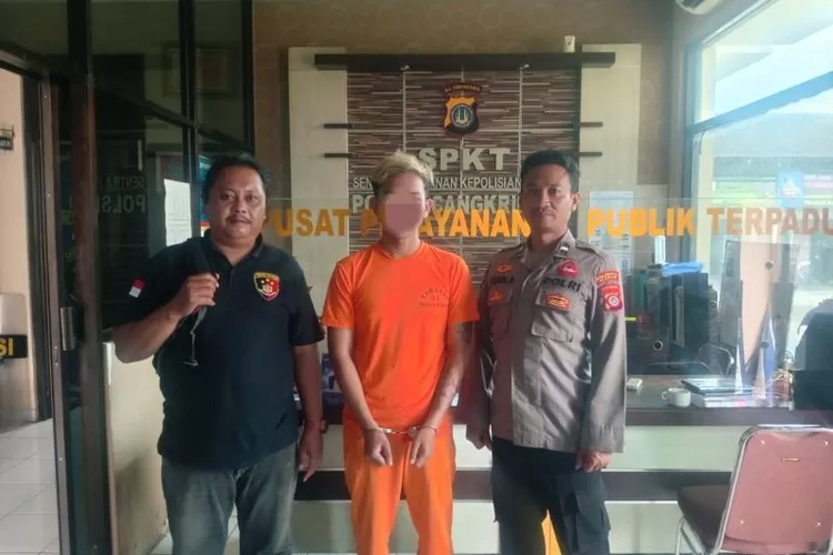 Pelaku saat diamankan di Polsek Cangkringan  (Foto: Samento Sihono)