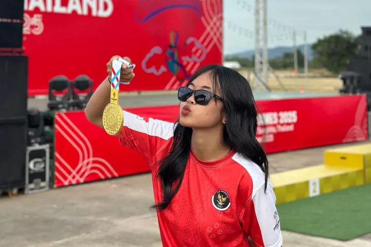 Disha Fajar Praharini suks es meraih medali emas di SEA Games 2025 Thailand.