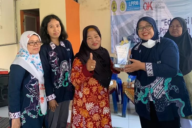 PkM USM Beri Edukasi Pencegahan Jebakan Pinjol Ilegal Warga Tambak Boyo Raya