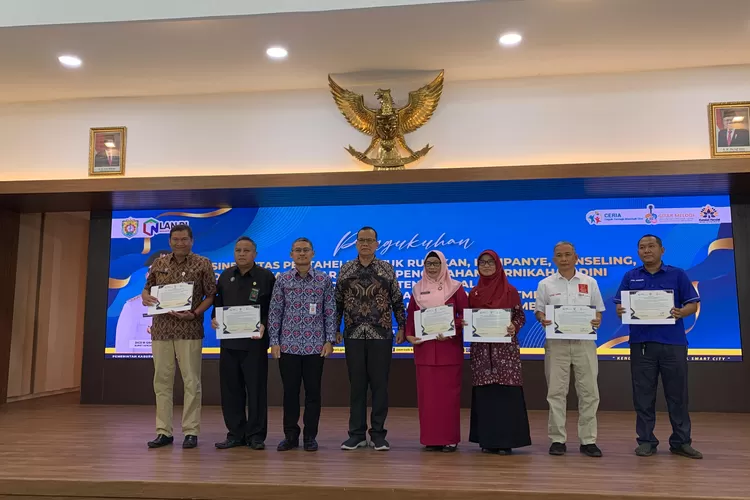 Pengukuhan tim Gitar Melodi pencegahan pernikahan dini dan penandatangan piagam komitmen cegah pernikahan dini di Pendopo Bahurekso Selasa 8 oktober 2024.  (Edi prayitno/kontributor Kendal)