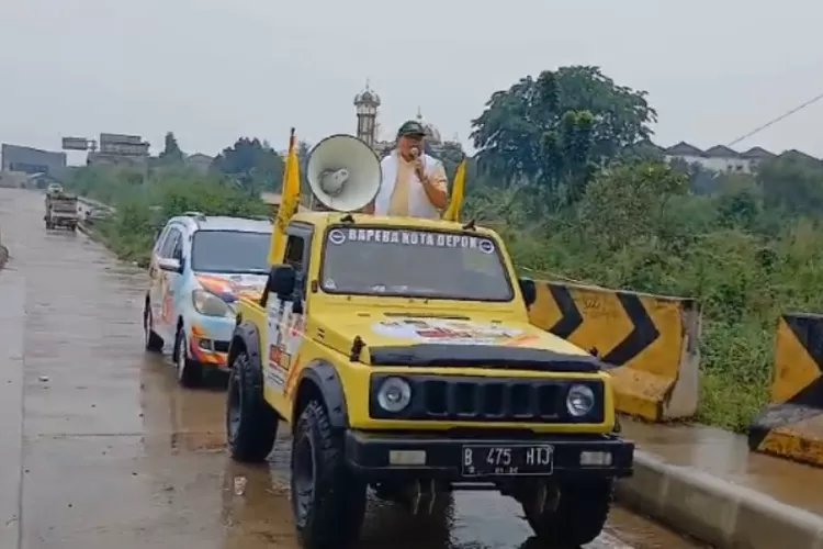 Tajudin Tabri Tengah Menaiki Mobil Suzuki Jimny yang Diduga Menggunakan Plat Nomor Palsu  (((Dok. Istimewa)))