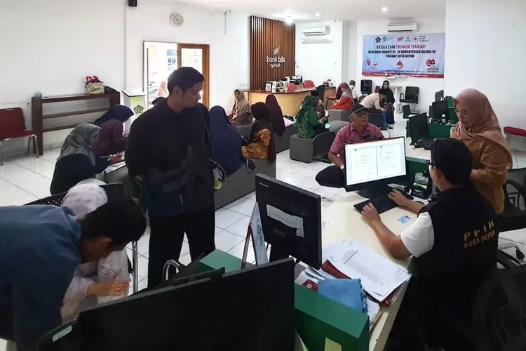 Suasana jamaah haji di kota depok saat melakukan pelunasan biaya keberangkatan haji (DOKUMEN KEMENAG DEPOK)
