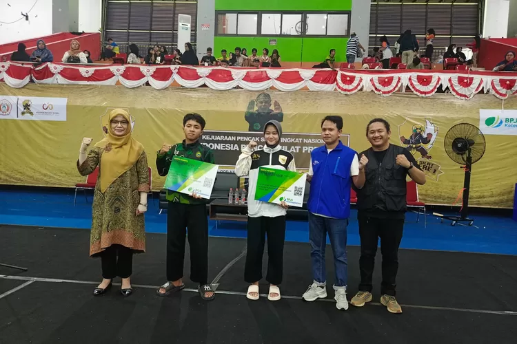 BPJS Ketenagakerjaan hadir dengan memberikan pelayanan perlindungan pada 406 atlet yang berlaga di Kejuaraan Pencak Silat Antar Pelajar Tingkat Nasional, di GOR Depok, Boulevard GDC.  (DOKUMEN BPJS KETENAGAKERJAAN)