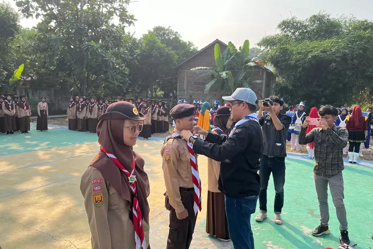 Ketua Bawaslu Karawang Engkus Kusnadi membuka secara simbolis Perkemahan MTP Al-Ahliyah Tahun 2024 (Samsudin)