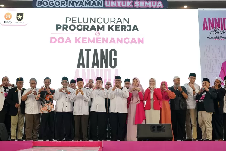 Foto bersama dalam kegiatan peluncuran program kerja dari Pasangan Atang-Annida di Pilkada 2024 Kota Bogor. 