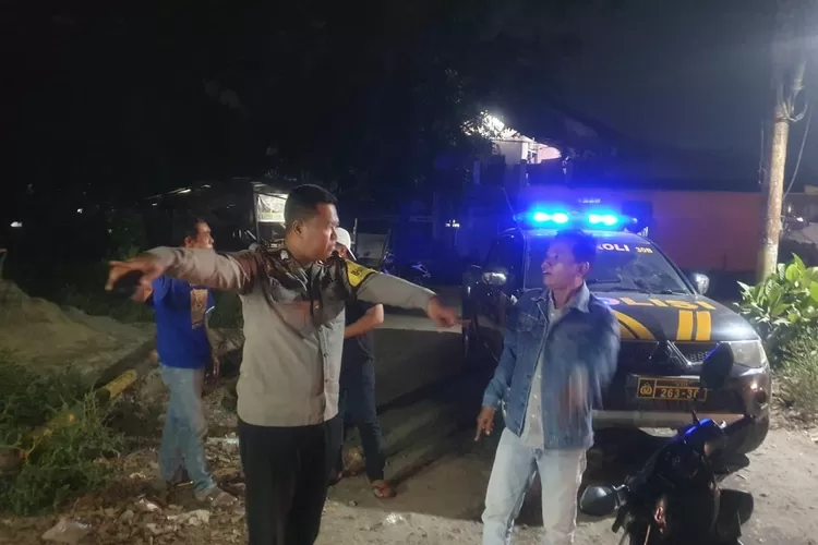 Polisi melakukan olah TKP Kecelakaan maut di Jalan Raya Cicangkal-Lapan, tepatnya di depan Portal Lapan, Kecamatan Rumpin, Kabupaten Bogor. (Polres Bogor)