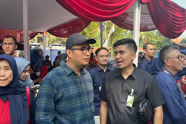 Ketua DPRD Kabupaten Bogor Sastra Winara saat menghadiri peringatan Hari Buruh di Fishing Valley Pasir Jambu, Kecamatn Sukaraja, Kabupaten Bogor, Selasa, 6 Mei 2025. (Riza)