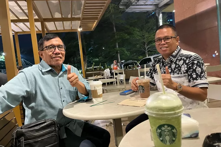 Ketum PWI Pusat Hendry Ch Bangun bersama Ady Indra Pawennari