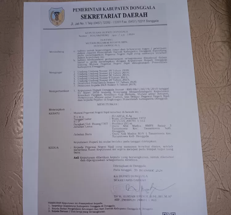 SK Zulkifli yang diterbitkan dan ditandatangani  oleh Sekda Donggala. 