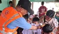 Seragam Bantuan Buat Senyum Mengembang Ketika Gerakan Anak Negeri dan Faji Sambangi Tapanuli Selatan