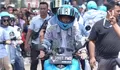 Gibran Rakabuming Raka Konvoi Menggunakan Motor ke Venue Kampanye: Buatan Anak Bangsa!