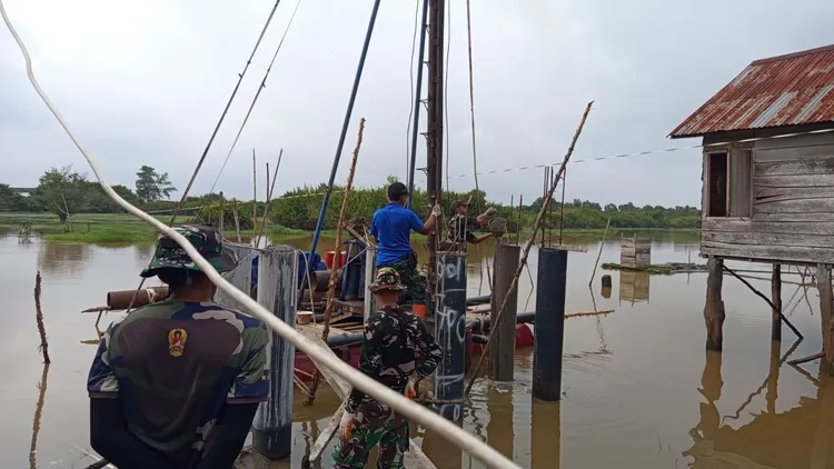 Lokasi Pembangunan Jembatan Gantung Sungai Dabuk, di Desa Embacang Kec.Mesuji Raya  Kab. Ogan Komering Ilir (OKI), Prov Sumsel.