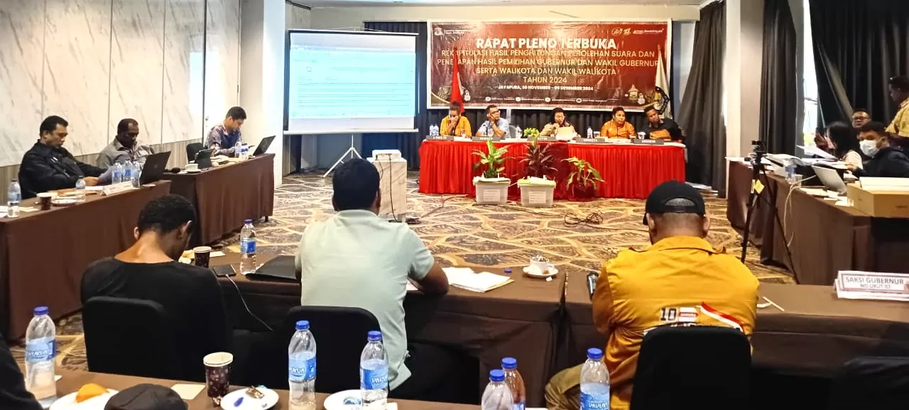 Proses rekapitulasi suara KPU Kota Jayapura yang berlangsung di Hotel Grand Abe, Rabu (11/12/2024).