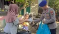 Pererat Hubungan Polri dan Masyarakat, Satpolairud Polresta Barelang Gelar Jumat Berkah Bagikan Nasi Kotak di Pesisir Perairan Tanjung Uma