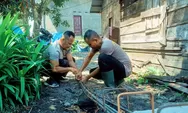 Diguyur Gerimis, Brimob Polda Sumut Tetap Bangun Rumah Korban Banjir Tapsel