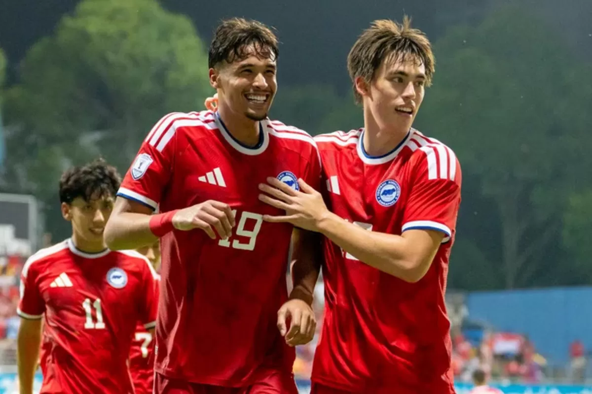 Singapura merayakan gol Ihsan Fandi yang membuat kedudukan sama 1-1 atas Indonesia di laga penentuan Grup A ASEAN Championship 2026, 7 Agustus.