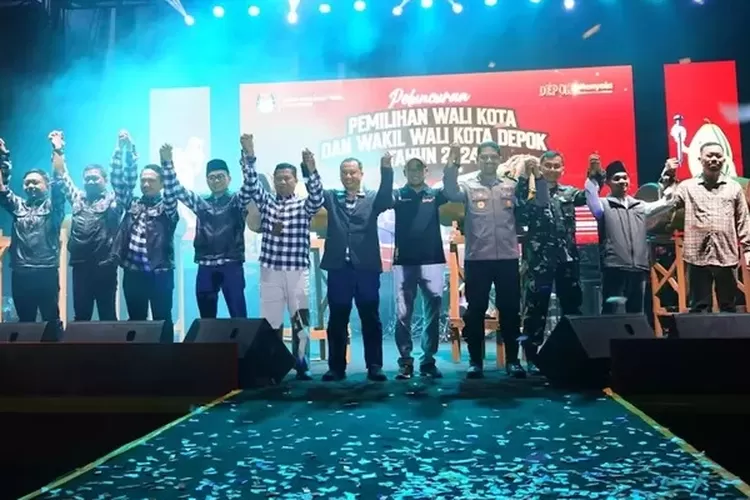 KPU Kota Depok secara resmi meluncurkan proses Pilkada Depok serta maskot dan jingle pemilu, di Ruko Verbena Grand Depok City (GDC), Kelurahan Tirtajaya, Kecamatan Sukmajaya, Kota Depok, Sabtu (8/6) malam. (AGNESYA WIANDA/RADAR DEPOK)