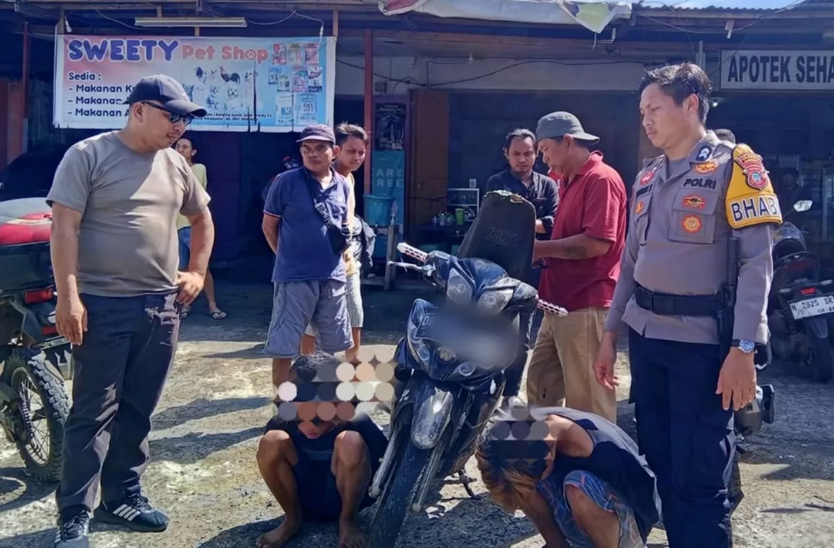Sinergitas warga, Pemerintah Desa, dan Polri adalah kunci keamanan kita, - Aipda Hendra Lempas. Suasana pengamanan pelaku tindak kriminal di wilayah hukum Polsek Pineleng. (Foto: Istimewa)