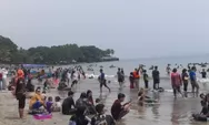 Liburan Lebaran 2025, Pantai Carita dipadati ribuan wisatawan yang ingin nikmati keindahan alam dan suasana pantai