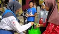 PMR SMPI Dian Didaktika Salurkan Bantuan, Gandeng SMPN 34 Depok Berikan ke Korban Banjir Pondok Cina