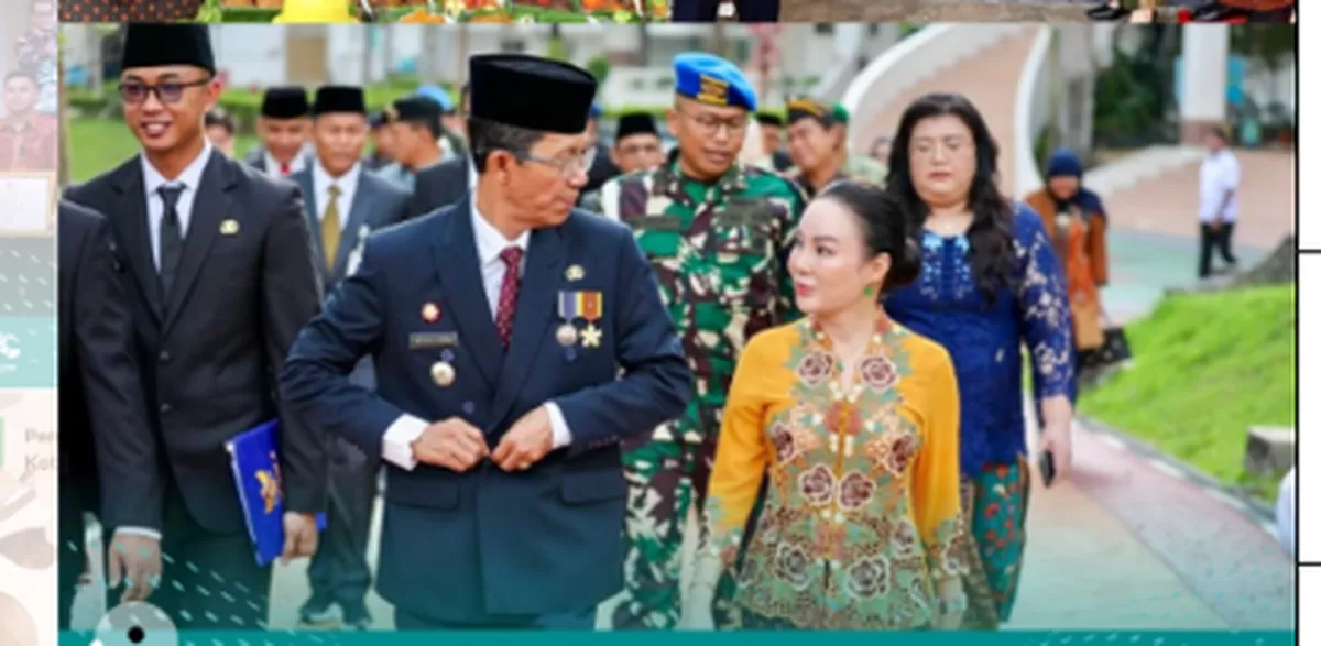 Walikota Batam Amsakar Achmad dan Wakil Walikota Batam Li Claudia Chandar jalan berbarengan usai menghadiri upacara HUT Satpol PP, Satlinmas, Damkar, sekaligus peringatan Hari Kartini.(Foto:ig Diskominfo Batam)