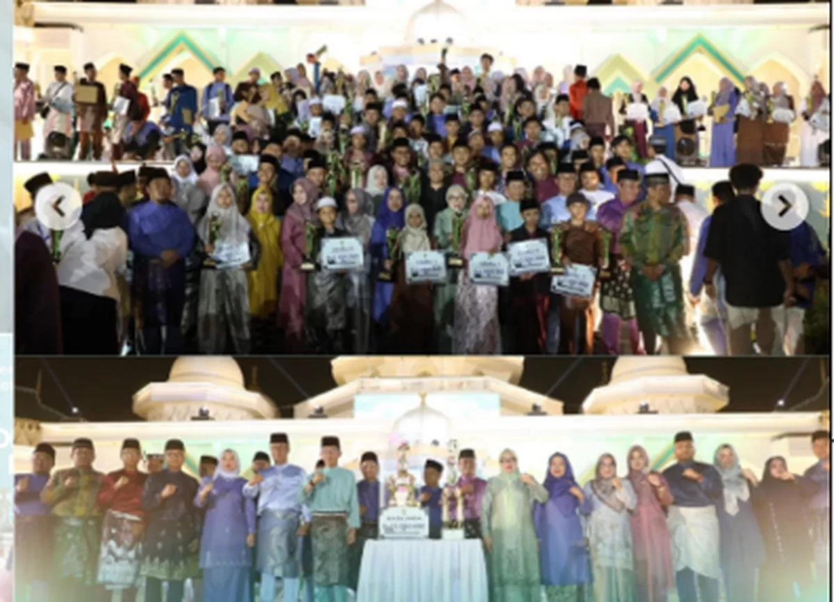 Walikota Batam Amsakar Achmad foto bersama dengan pesera juara saat menutupan kegiatan MTQH XXXIV tingkat Kota Batam.(Foto:Diskominfo Batam).