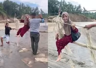 Warga Desa di Bireuen Aceh Bertaruh Nyawa usai Bencana, Lintasi Derasnya Arus Sungai dengan Tali dan Sebatang Bambu