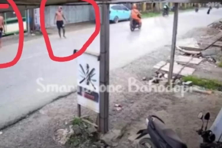 Screenshot, dua orang diduga mabuk turun kejalan buat keributan dijalan raya Bahomakmur, Bahodopi
