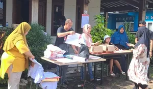 Ganjar Pranowo – Mahfud MD Canvassing Day, Relawan di Depok Sebar 65 Ribu Atribut Kampanye