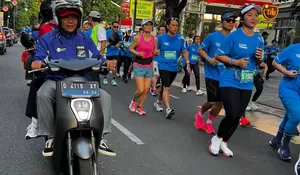 Motor Listrik Honda EM1 e  Kawal Pelari Pocari Sweat Run 2024