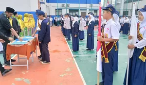 Osis SMPN 30 Depok Dilantik, Kepsek Agus: Harus Jadi Suri Tauladan