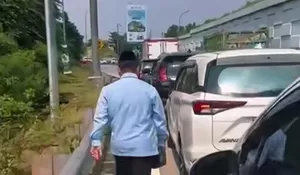 Viral! Supian Suri Arungi Macetnya Jalan Sawangan Raya, Warganet : Menyala Pak Wali