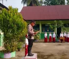 Peduli Generasi Penerus, Bhabinkamtibmas Polsek Batu Hampar Jadi Pembina Upacara Bendera