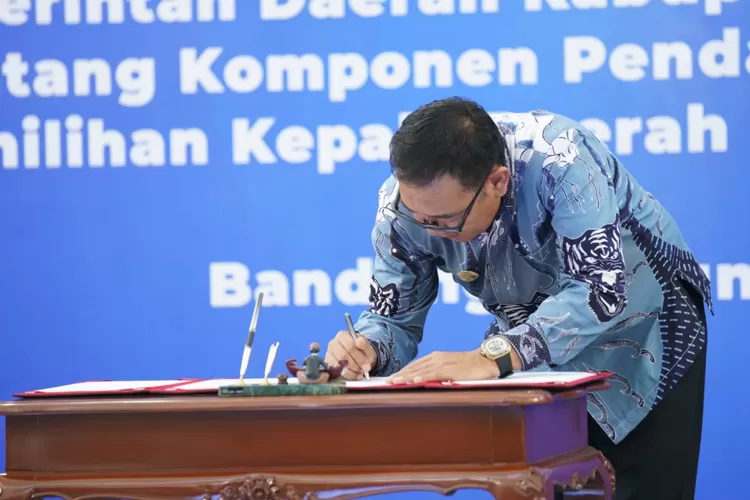 Iwan Setiawan Teken Kesepakatan Pendanaan Pilkada Serentak 2024 ...