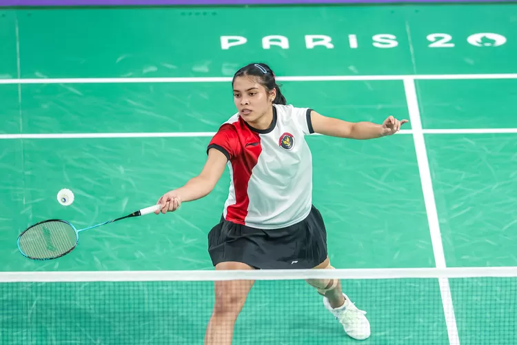 Tunggal putri Indonesia Gregoria Mariska Tunjung lolos ke babak 16 besar Olimpiade Paris 2024 setelah mengalahkan wakil Republik Ceko Tereza Svabikova di Porte de la Chapelle Arena pada Rabu (31/7). (foto: PBSI/Badmintonphoto/Mikael Ropars)